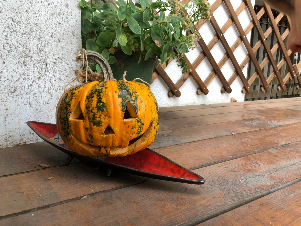 A carved pumpkin in a pan? Not sure.